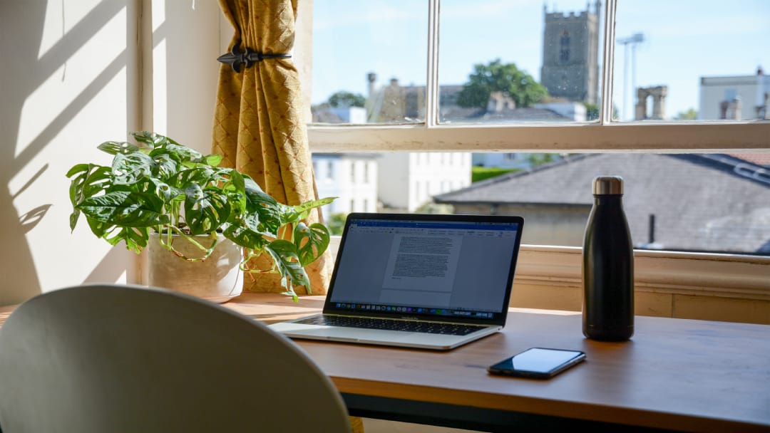 Working from home at a minimalist desk